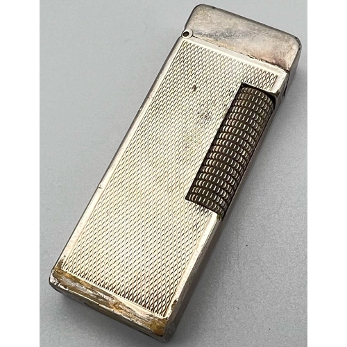 884 - A Vintage Dunhill Silver-Toned Lighter. As found