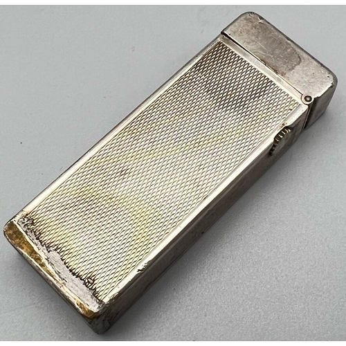 884 - A Vintage Dunhill Silver-Toned Lighter. As found