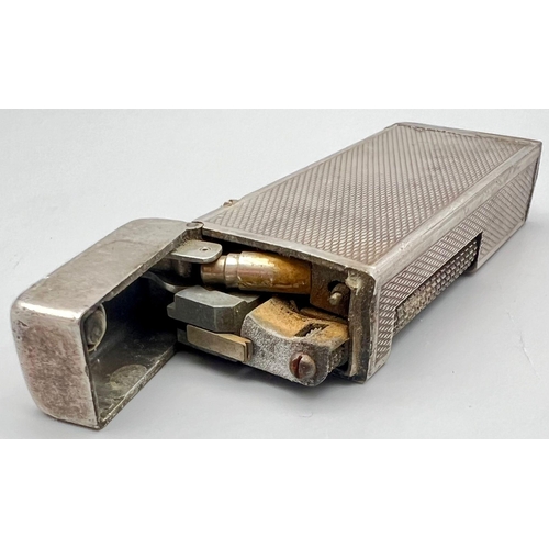 884 - A Vintage Dunhill Silver-Toned Lighter. As found