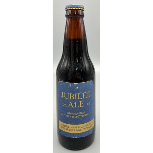 1183 - A 1977 Bottle of Jubilee Ale - Brewed by Greene King and Sons Ltd. 20cm tall.