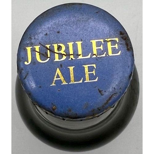 1183 - A 1977 Bottle of Jubilee Ale - Brewed by Greene King and Sons Ltd. 20cm tall.