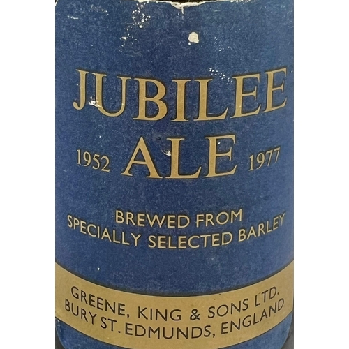 1183 - A 1977 Bottle of Jubilee Ale - Brewed by Greene King and Sons Ltd. 20cm tall.