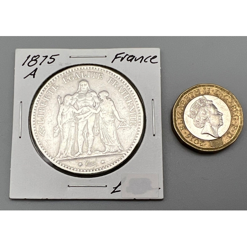 807 - An 1875 French Silver Five Franc Coin. Please see photos for conditions.