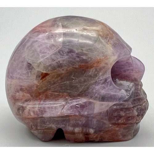 223 - A weird and wonderful, hand carved, amethyst scull with great detail. Dimensions: 50 x 40 x 35 mm, w... 