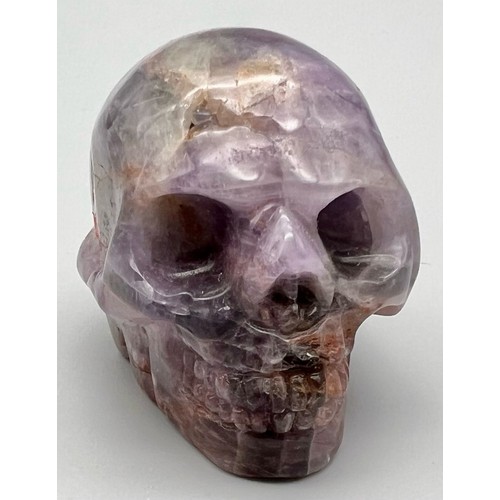 223 - A weird and wonderful, hand carved, amethyst scull with great detail. Dimensions: 50 x 40 x 35 mm, w... 