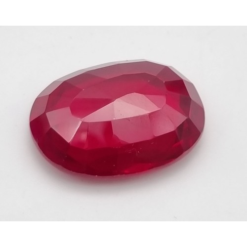 139 - An excellent, blood red, oval cut, large (51.45 carats) ruby. Dimensions: 26.29 x 19.80 x 8.89 mm. B... 