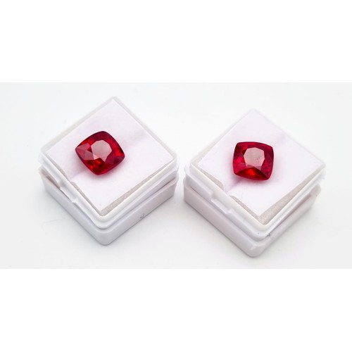 230 - A fabulous pair of cushion cut, bright red rubies. Dimensions: 11.54 x 11.28 x 7.85 mm and 11.46 x 1... 