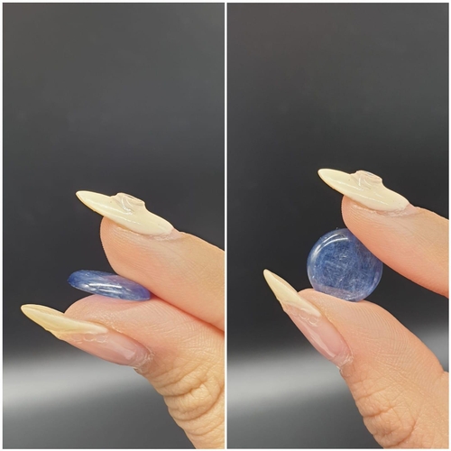 1220 - 6.82 Ct Kyanite. Round cabochon. IDT certified