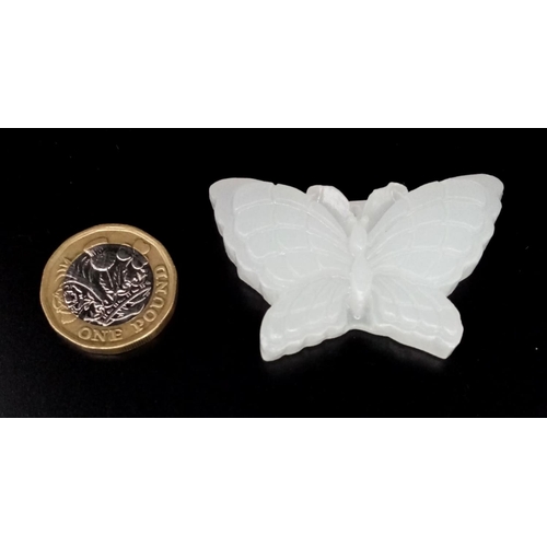 1294 - A White Jade Butterfly Pendant. 5 x 3cm.