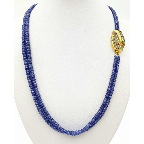 1298 - Rare Dual Strand Blue Sapphire Necklace, with a Gold plated clasp embedded with Tourmalines. 47.5g. ... 