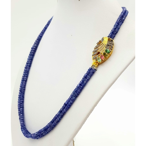 1298 - Rare Dual Strand Blue Sapphire Necklace, with a Gold plated clasp embedded with Tourmalines. 47.5g. ... 