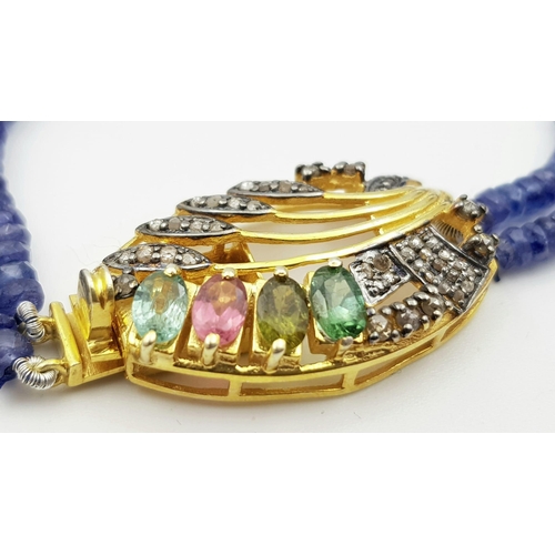 1298 - Rare Dual Strand Blue Sapphire Necklace, with a Gold plated clasp embedded with Tourmalines. 47.5g. ... 