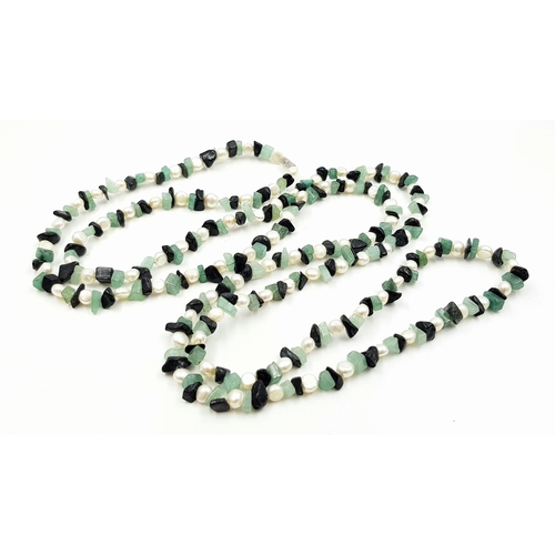 741 - A Very Long Freshwater Pearl and Aventurine Rope Necklace. 120cm