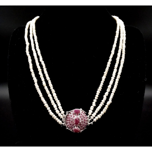 694 - Triple Strand Pearl Necklace with 925 Silver Ruby Clasp and UGL USA American Appraisal Report. 36-44... 