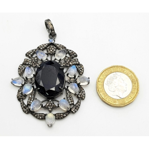 95 - A 925 Silver Blue Sapphire Pendant with a 28ct Sapphire. Moonstones and Real Diamonds Surround. UGL ... 