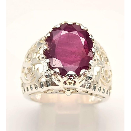 1318 - 7.35cts Oval Cut Ruby Gemstone Ring in Vintage style, 925 Silver. 8.69 grams. Size: O 1/2