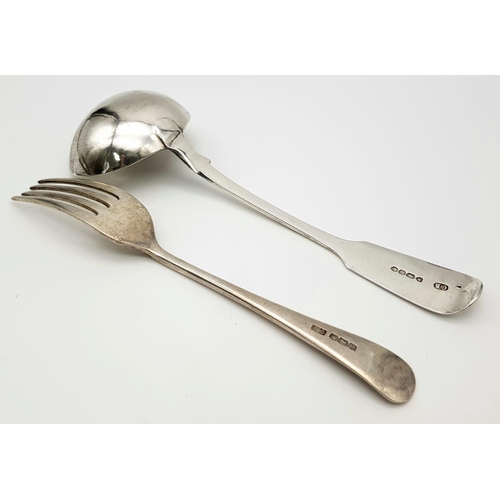 687 - An Antique Small Ladle Silver Spoon and Fork. London and Sheffield Hallmarks. 18cm. 108g