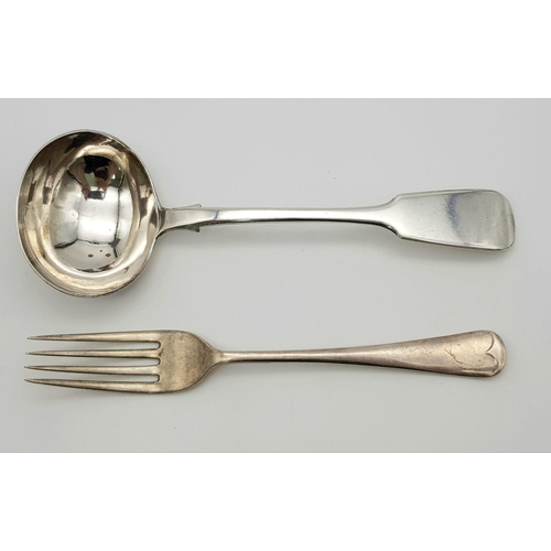 687 - An Antique Small Ladle Silver Spoon and Fork. London and Sheffield Hallmarks. 18cm. 108g