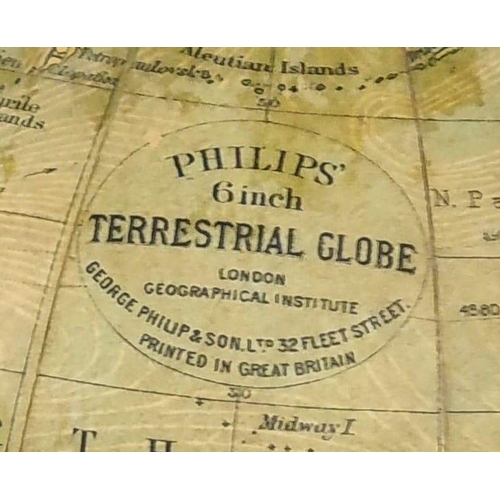 327 - A 1936 Phillips 6 inch table top globe. A lovely 1936 Phillips 6 inch terrestrial globe. 10,1/2 inch... 