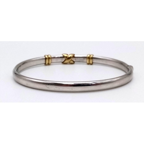 5 - A Stylish White and Yellow 9K Gold Bangle. Clip open for easy access. 10.13g. 6cm inner diameter.