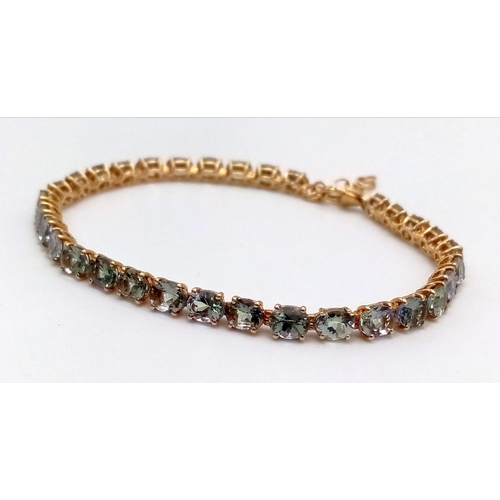 11 - A 10K Yellow Gold Aquamarine Tennis Bracelet. 32 clear aquamarine stones create this classic piece. ... 