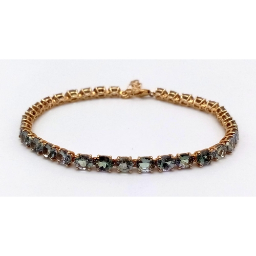 11 - A 10K Yellow Gold Aquamarine Tennis Bracelet. 32 clear aquamarine stones create this classic piece. ... 