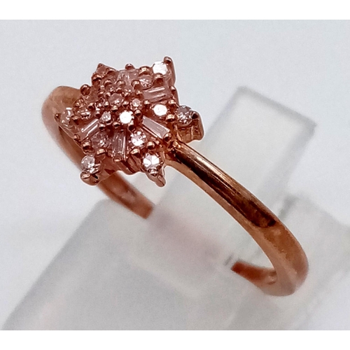 512 - A Lovely 9K Rose Gold Diamond Ring. Floral decorative diamond cluster. Size N. 2g total weight