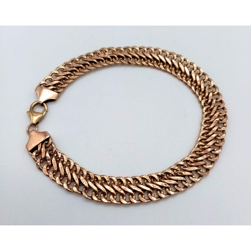 64 - A Beautiful 9K Yellow Gold Crossover S-Link Bracelet. 17cm.
5.63g