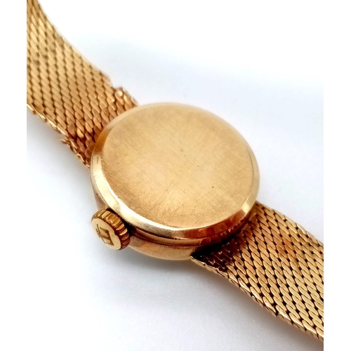 1012 - A Vintage 9K Gold Ladies Tissot Watch. 9K gold strap and case - 16mm. Kink in strap so a/f. Original... 