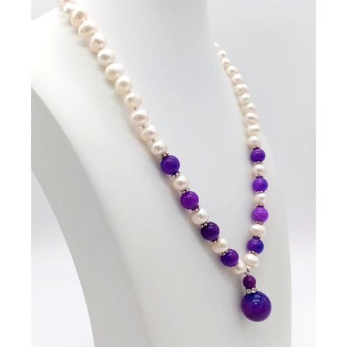 499 - A Cultured Akoya Pearl and Sugilite Bead Necklace and Pendant. 2.5 and 42cm.