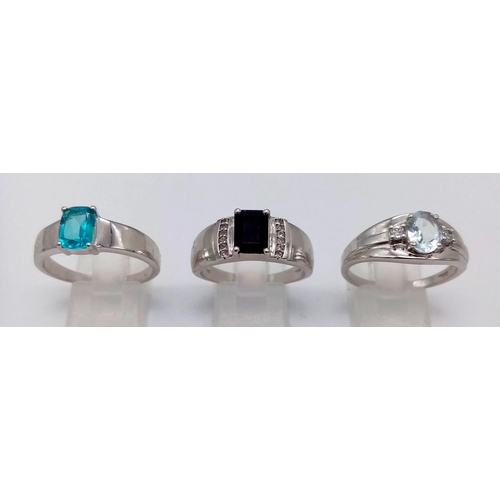 1226 - Three 925 Silver Stone Set Gents Dress Rings: Garnet, Topaz and Clear Quartz. All size V 1/2. 15.29g... 