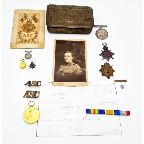 103 - A WW1 British Mons Star Trio Full size Medals, Miniatures, 5th Aug. – 22nd Nov. 1914 Bar & Rosette. ... 