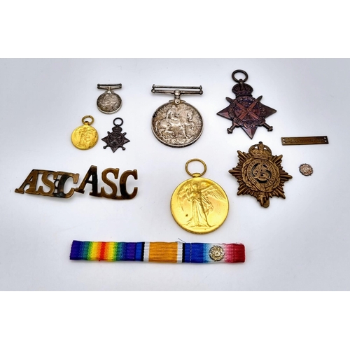 103 - A WW1 British Mons Star Trio Full size Medals, Miniatures, 5th Aug. – 22nd Nov. 1914 Bar & Rosette. ... 