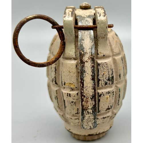 348 - An INERT WW2 British N° 36 Mills Hand Grenade Painted in Sand Colour for the Desert.