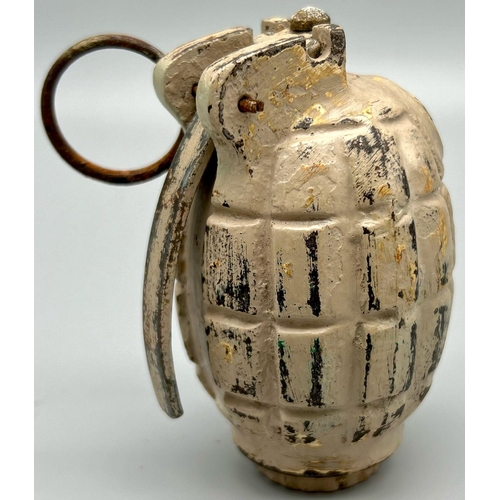 348 - An INERT WW2 British N° 36 Mills Hand Grenade Painted in Sand Colour for the Desert.