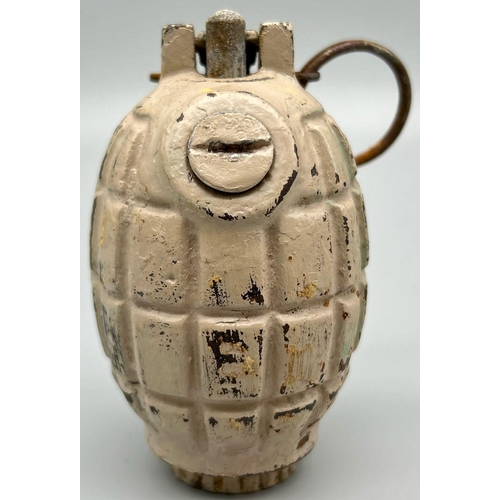 348 - An INERT WW2 British N° 36 Mills Hand Grenade Painted in Sand Colour for the Desert.