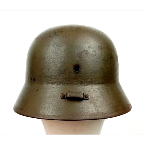 47 - A WW2 Hungarian M-38 Helmet used by the finish 4th Division Kev Os. 4 (light unit N°4). The mobile S... 