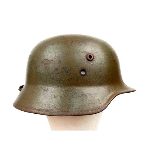 47 - A WW2 Hungarian M-38 Helmet used by the finish 4th Division Kev Os. 4 (light unit N°4). The mobile S... 