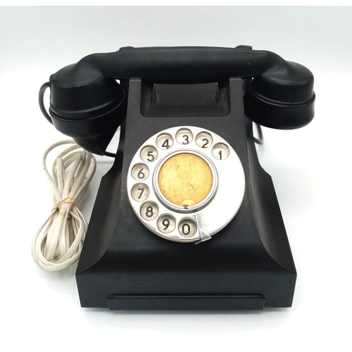 6 - A 1940s English GPO Black Bakelite Phone in Working Order!
Serial marks on handset. 25 x 19cm.