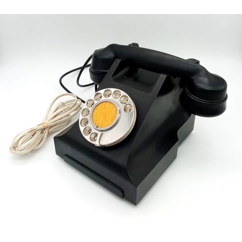 6 - A 1940s English GPO Black Bakelite Phone in Working Order!
Serial marks on handset. 25 x 19cm.