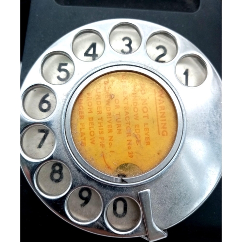 6 - A 1940s English GPO Black Bakelite Phone in Working Order!
Serial marks on handset. 25 x 19cm.