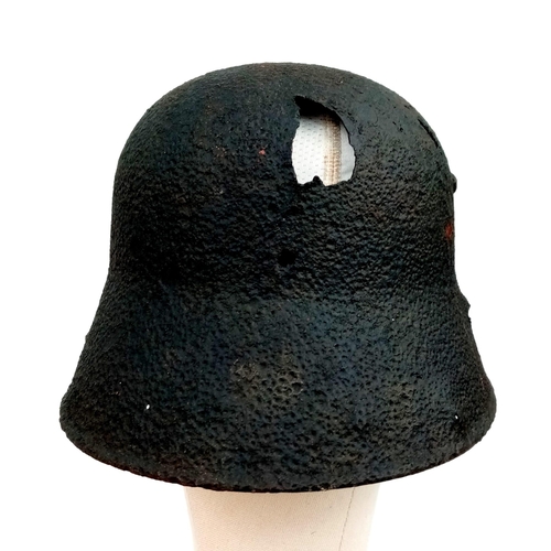 615 - WW1 German M16 Stahlhelm Helmet found near Cambrai with Post War Memorial.