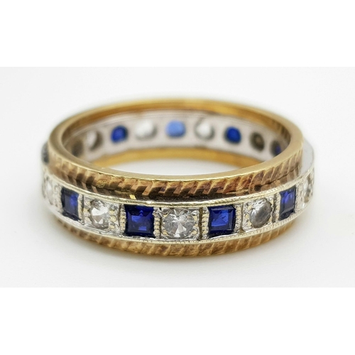 1141 - A 9K Two-Tone Gold Blue and White Sapphire Eternity Ring. Size L 1/2. 3.75g total weight.