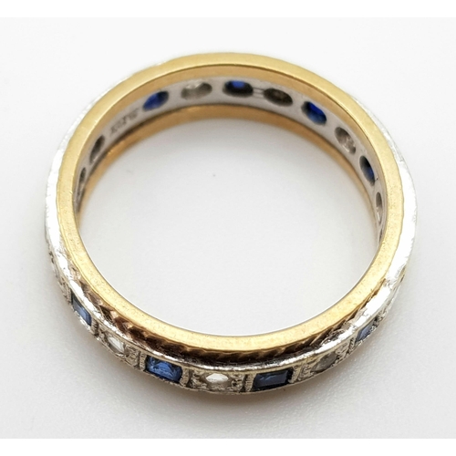 1141 - A 9K Two-Tone Gold Blue and White Sapphire Eternity Ring. Size L 1/2. 3.75g total weight.