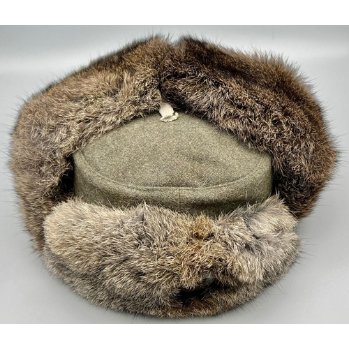 124 - A WW2 German 1942 Pattern Winter Hat. Nicknamed the “Russian Front” Cap. Badged to the Field Police.