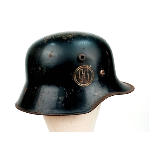 26 - 3rd Reich S.S.V.T. M17 Helmet. Typical of the Period.