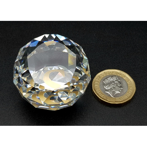 430 - A SWAOVSKI CRYSTAL CUT GLASS PAPERWEIGHT. 89.5gms  4cms diameter