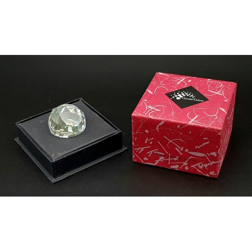 430 - A SWAOVSKI CRYSTAL CUT GLASS PAPERWEIGHT. 89.5gms  4cms diameter