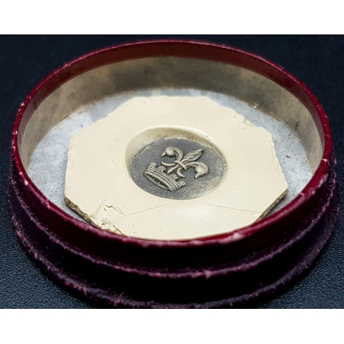 436 - AN ANTIQUE FRENCH ROYAL SEAL IN A ROUND BOX.