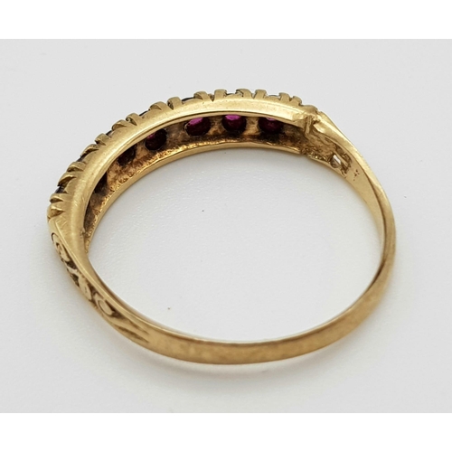 914 - A Vintage 9K Ruby Half-Eternity Ring. Seven rubies. Size N. 1.85g total weight.